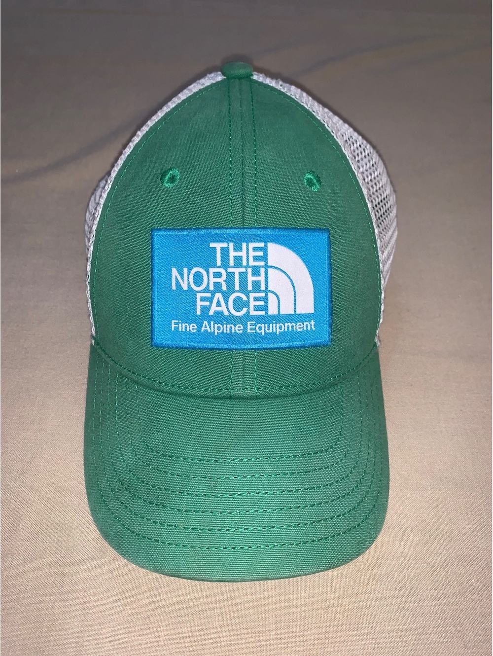 The North Face green white trucker hat youth one size